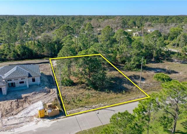 Property at 616 Raintree St E, Lehigh Acres, FL 33974