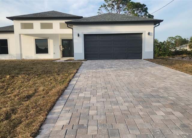 Property at 2810 44th St SW, Lehigh Acres, FL 33976, 4 beds, 2 baths