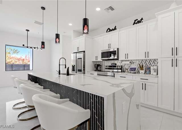 Property at 833 SW 16th Ter, Cape Coral, FL 33991, 4 beds, 3 baths