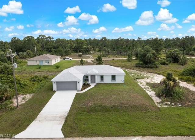Property at 3108 62 St W, Lehigh Acres, FL 33971, 4 beds, 2 baths