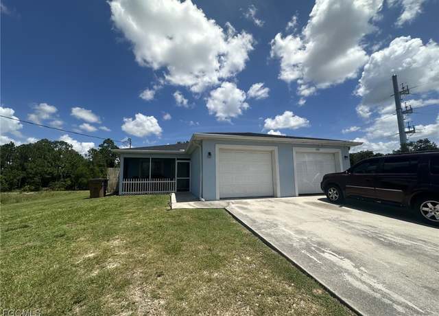 Property at 4402 Douglas Ln, Lehigh Acres, FL 33973, 4 beds, 4 baths
