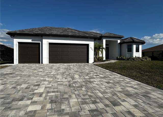 Property at 901 NW 33rd Pl, Cape Coral, FL 33993, 3 beds, 3 baths