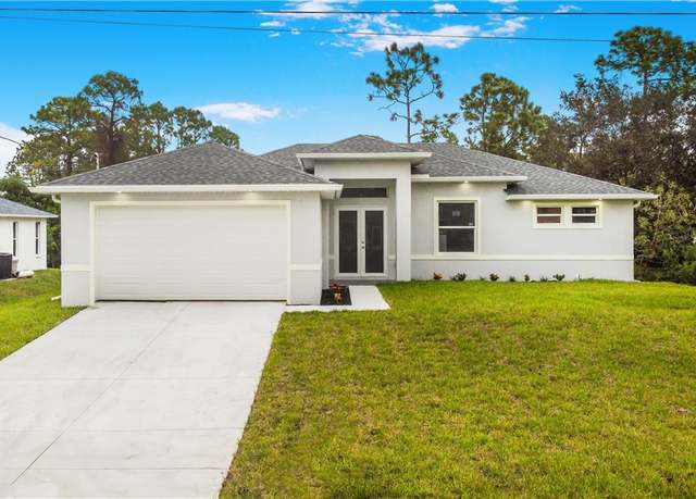 Property at 2604 10th St W, Lehigh Acres, FL 33971, 3 beds, 2 baths