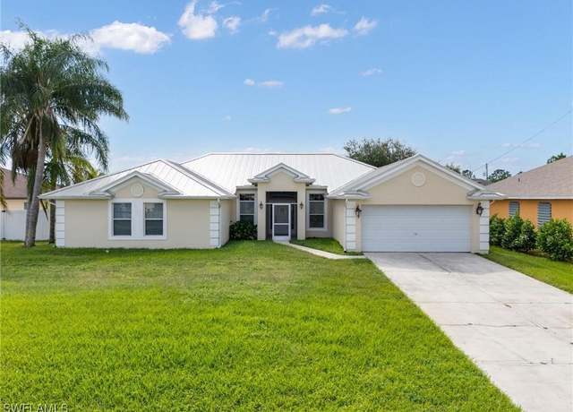Property at 409 Windermere Dr, Lehigh Acres, FL 33972, 4 beds, 2 baths