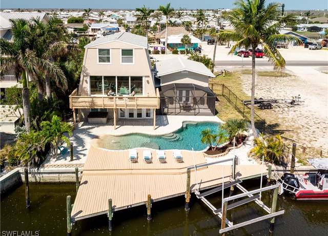 Property at 3128 Stringfellow Rd, St. James City, FL 33956, 4 beds, 3.5 baths