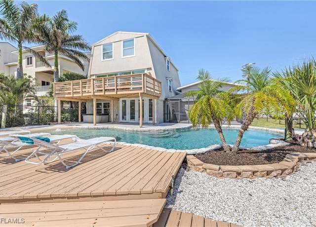 Property at 3128 Stringfellow Rd, St James City, FL 33956, 4 beds, 3.5 baths