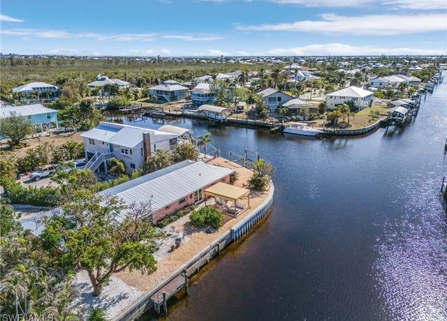 Property at 3201/3203 Stabile Rd, St. James City, FL 33956, 4 beds, 2 baths