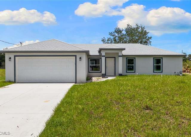 Property at 1120 Chiefland St E, Lehigh Acres, FL 33974, 4 beds, 2 baths