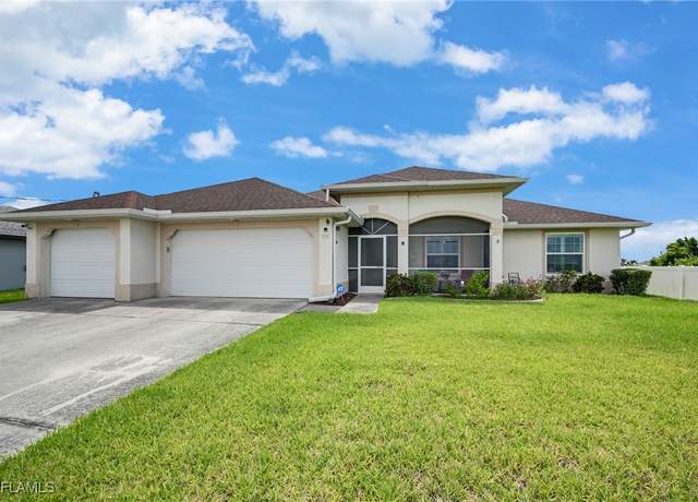 Property at 2703 NE Juanita Pl, Cape Coral, FL 33909, 4 beds, 2 baths
