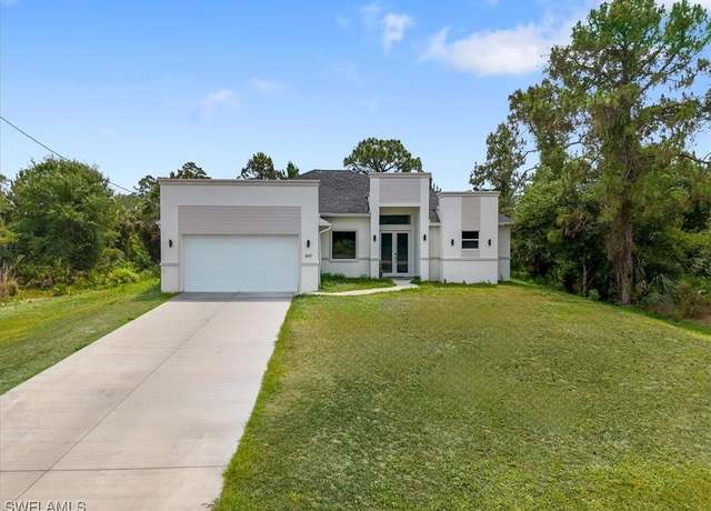 Property at 409 Columbus Blvd S, Lehigh Acres, FL 33974, 3 beds, 2.5 baths