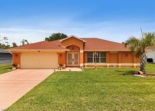 Property at 709 Milwaukee Blvd, Lehigh Acres, FL 33974, 4 beds, 2 baths