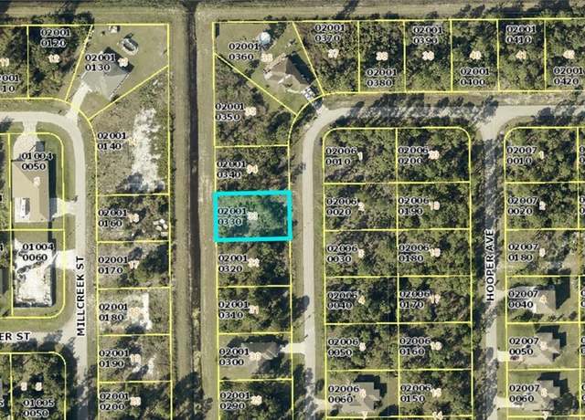 Property at 515 Hutton St E, Lehigh Acres, FL 33974