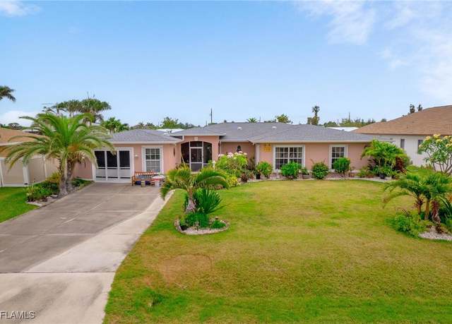Property at 134 Dartmouth Dr NW, Port Charlotte, FL 33952, 3 beds, 2.5 baths