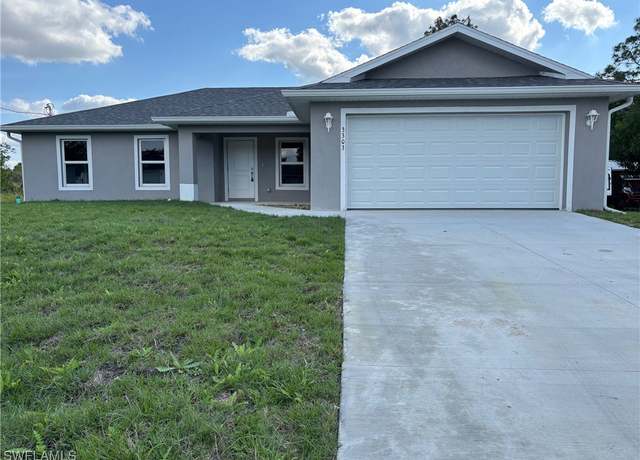 Property at 3303 26th St W, Lehigh Acres, FL 33971, 3 beds, 2 baths