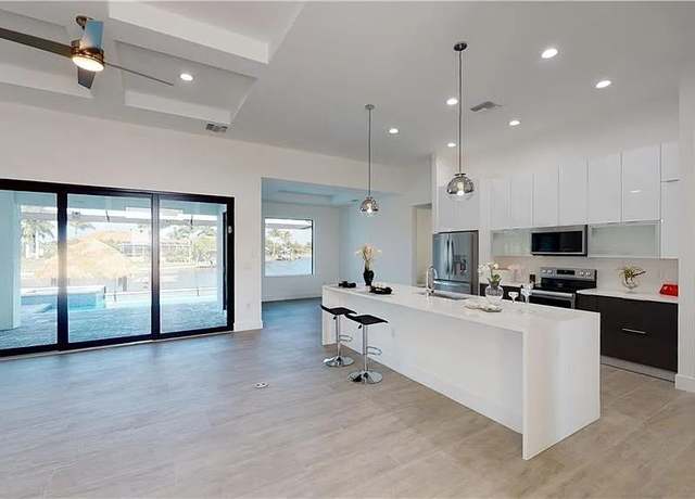 Property at 1525 NW 34th Ave, Cape Coral, FL 33993, 4 beds, 3 baths