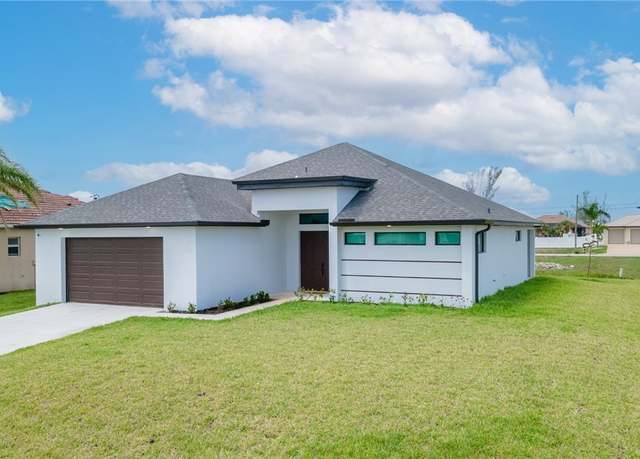 Property at 1209 NE 7th Ave, Cape Coral, FL 33909, 3 beds, 3.5 baths
