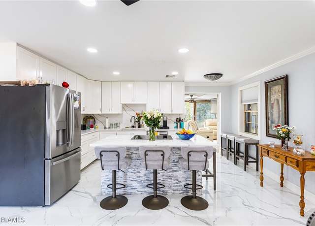 Property at 3954 Coconut Cir N, Naples, FL 34104, 3 beds, 2 baths