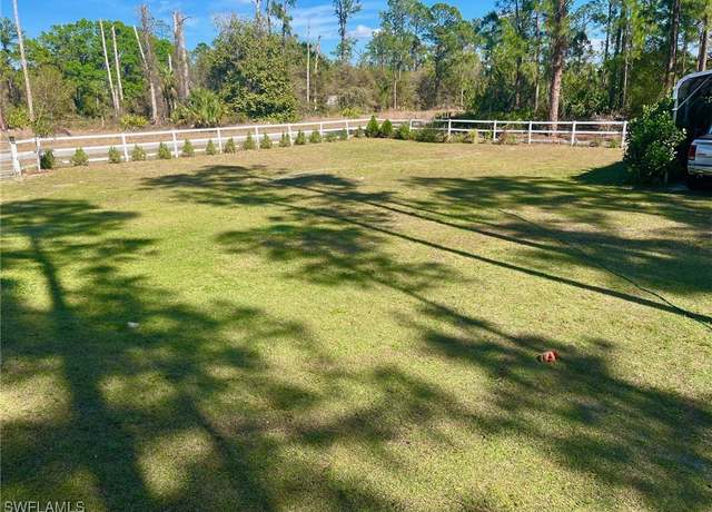 Property at 822 Johns Ave, Lehigh Acres, FL 33972, 3 beds, 2 baths