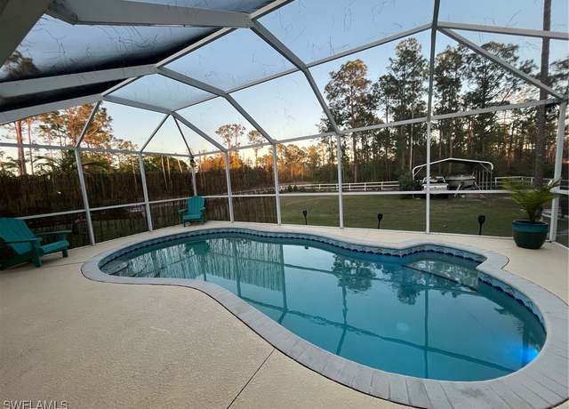 Property at 822 Johns Ave, Lehigh Acres, FL 33972, 3 beds, 2 baths