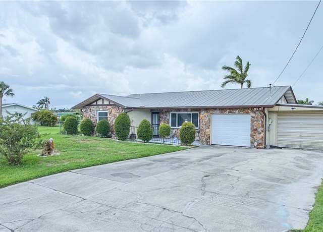 Property at 453 Stipe St, North Fort Myers, FL 33903, 4 beds, 3 baths