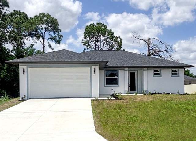 Property at 3210 30th St SW, Lehigh Acres, FL 33976, 3 beds, 2 baths
