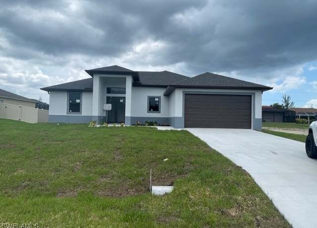 Property at 2435 Tropicana Pkwy W, Cape Coral, FL 33993, 3 beds, 2 baths