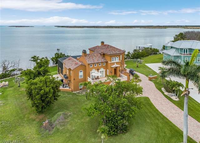 Property at 4961 Galt Island Ave, St James City, FL 33956, 3 beds, 3.5 baths