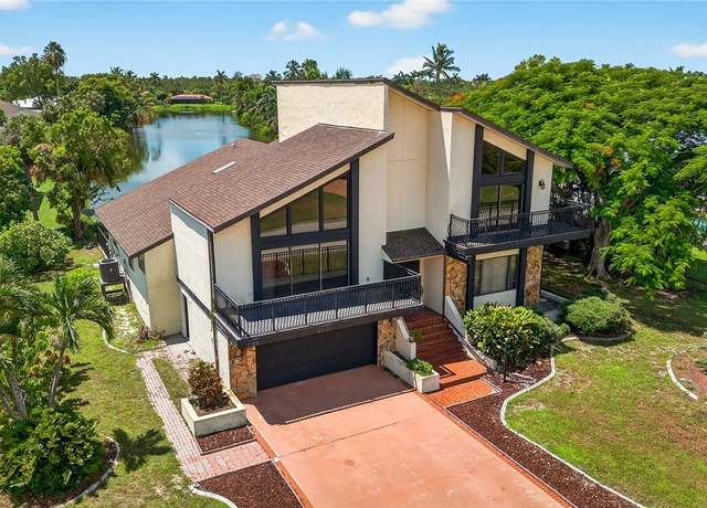 Property at 14979 Bonaire Cir, Fort Myers, FL 33908, 5 beds, 3 baths