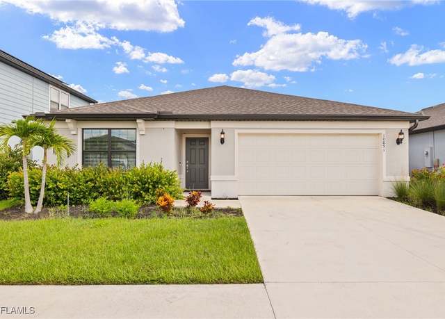 Property at 10891 Firebush Cir, North Fort Myers, FL 33917, 4 beds, 2 baths