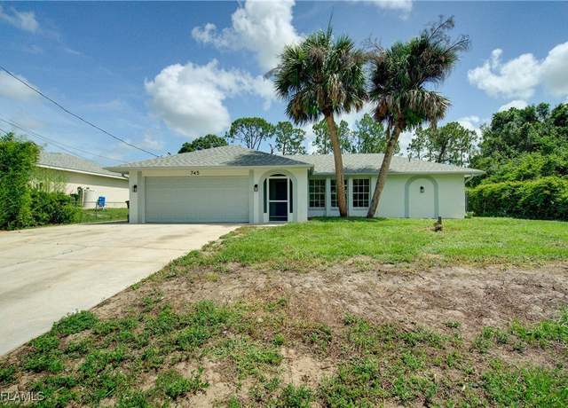 Property at 745 Grant Blvd, Lehigh Acres, FL 33974, 3 beds, 2 baths