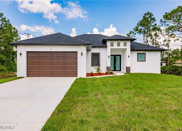 Property at 2502 E 10th St, Lehigh Acres, FL 33936, 3 beds, 2.5 baths