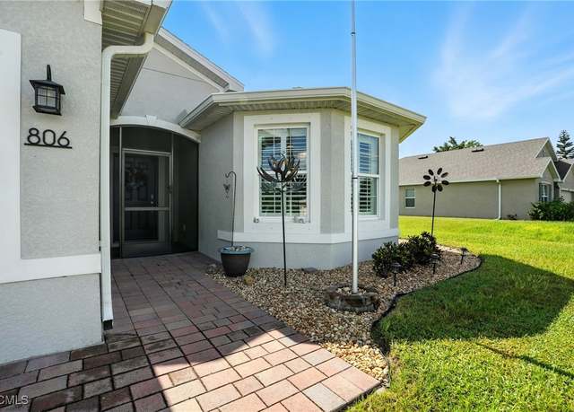 Property at 806 Champion Ave, Lehigh Acres, FL 33971, 3 beds, 2 baths