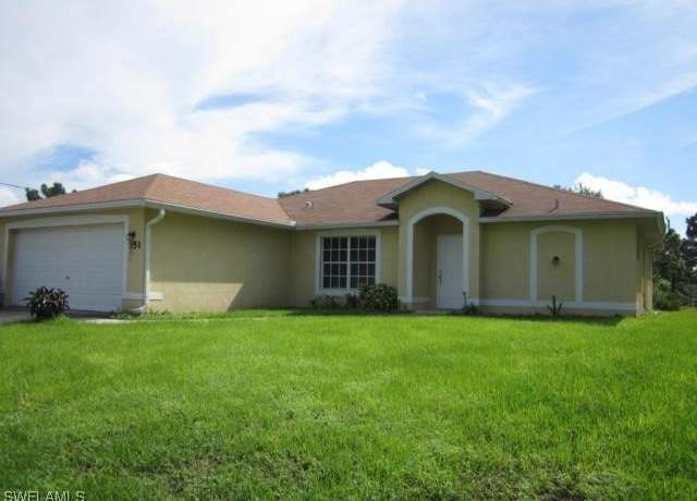 Property at 551 Eisenhower Blvd, Lehigh Acres, FL 33974, 4 beds, 2 baths