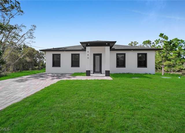 Property at 946 Panda Dr, Lehigh Acres, FL 33974, 4 beds, 3 baths