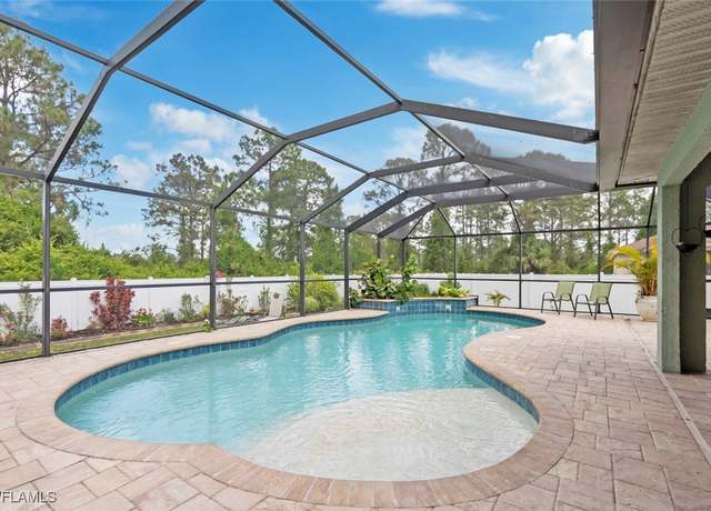 Property at 3120 69th St W, Lehigh Acres, FL 33971, 3 beds, 2 baths