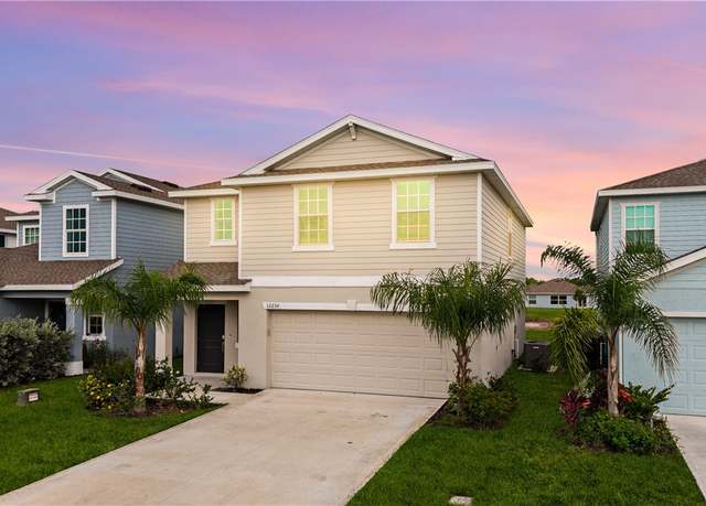 Property at 12230 Dakota Ridge Pl, Lehigh Acres, FL 33974, 4 beds, 2.5 baths