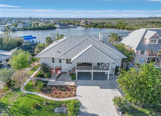 Property at 2771 Teal Ct, St. James City, FL 33956, 4 beds, 3.5 baths