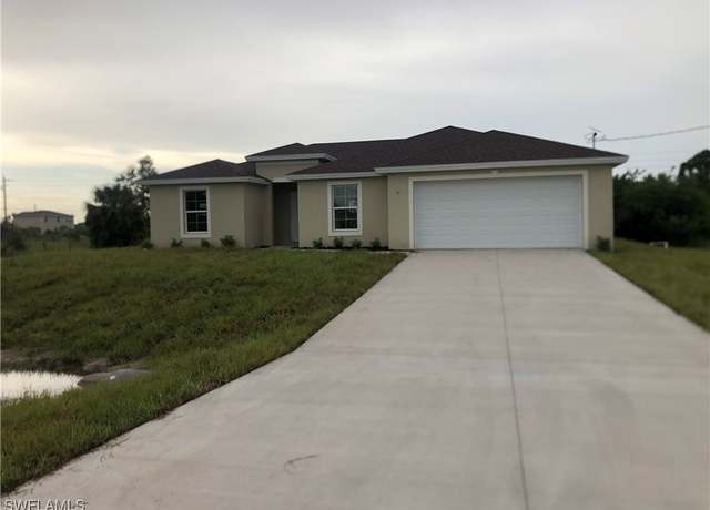 Property at 712 Oakridge Ave S, Lehigh Acres, FL 33974, 3 beds, 2 baths