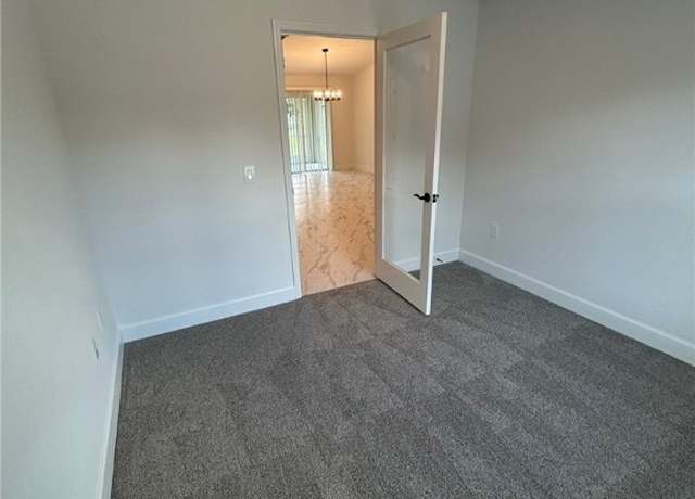 Property at 712 Oakridge Ave S, Lehigh Acres, FL 33974, 3 beds, 2 baths