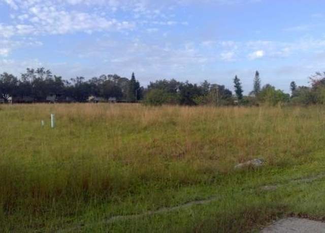Property at 32 Cosmopolitan Dr, Lehigh Acres, FL 33936