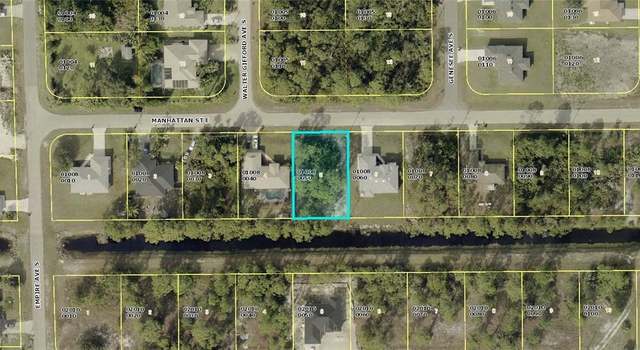 Photo of 710 Manhattan St E, Lehigh Acres, FL 33974