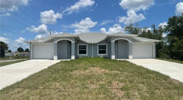 Photo of 701/703 Ivan Ave S, Lehigh Acres, FL 33973