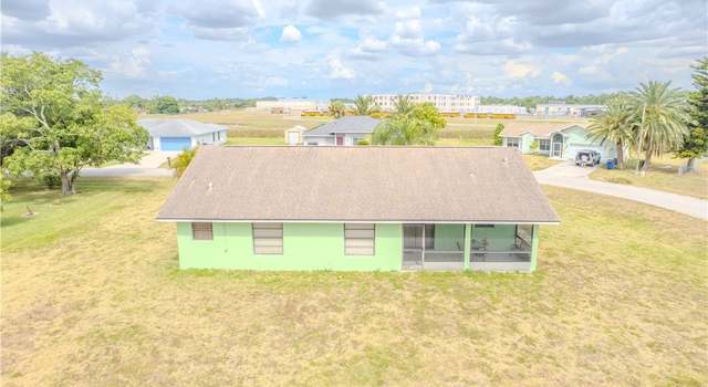 Photo of 214 Eaglesmere Dr, Lehigh Acres, FL 33936