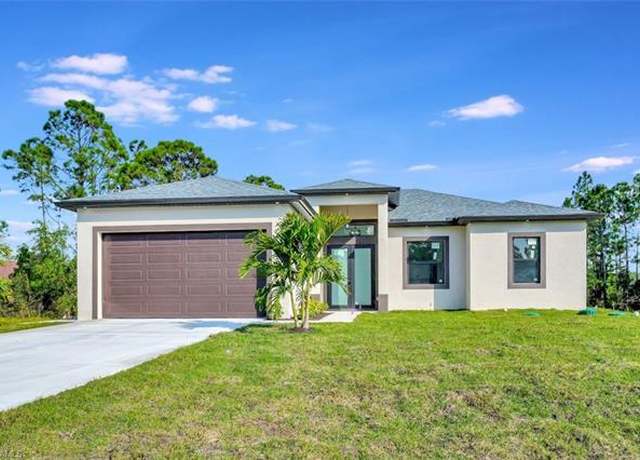 Property at 719 Fullerton Ave S, Lehigh Acres, FL 33974, 3 beds, 2 baths