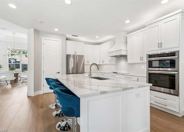 Property at 24990 Divot Dr, Bonita Springs, FL 34135, 4 beds, 3 baths