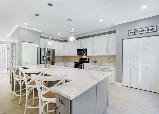 Property at 1350 Triandra Ln, Naples, FL 34119, 4 beds, 2.5 baths