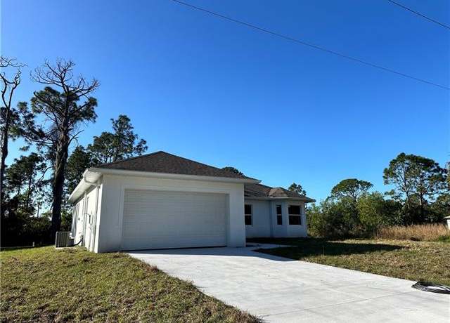 Property at 718 Chattman St E, Lehigh Acres, FL 33974, 3 beds, 2 baths