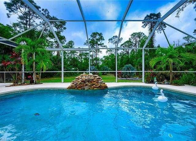 Property at 4595 16th St NE, Naples, FL 34120, 4 beds, 3 baths