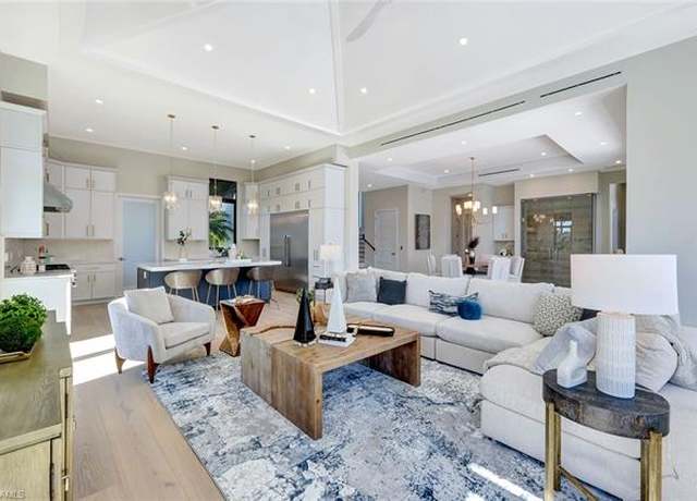Property at 10720 Vanderbilt Dr, Naples, FL 34108, 5 beds, 4.5 baths