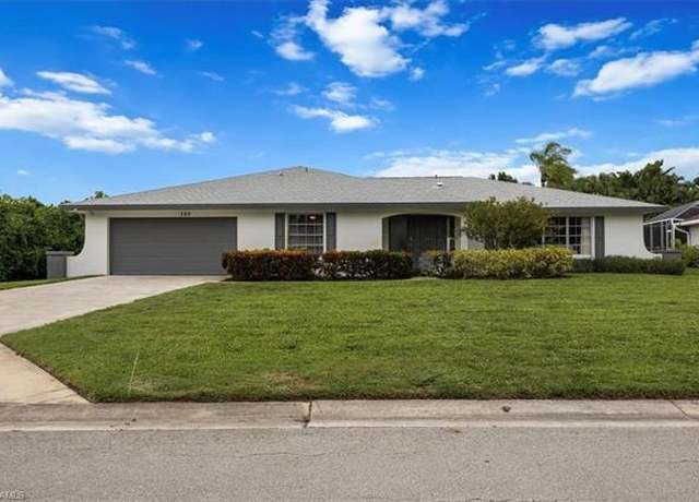 Property at 389 Country Club Ln, Naples, FL 34110, 4 beds, 3 baths